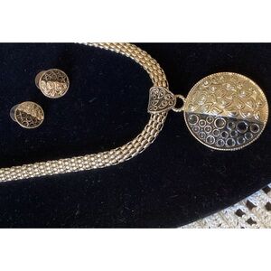 Silver and black costume jewelry set, necklace and earrings.
